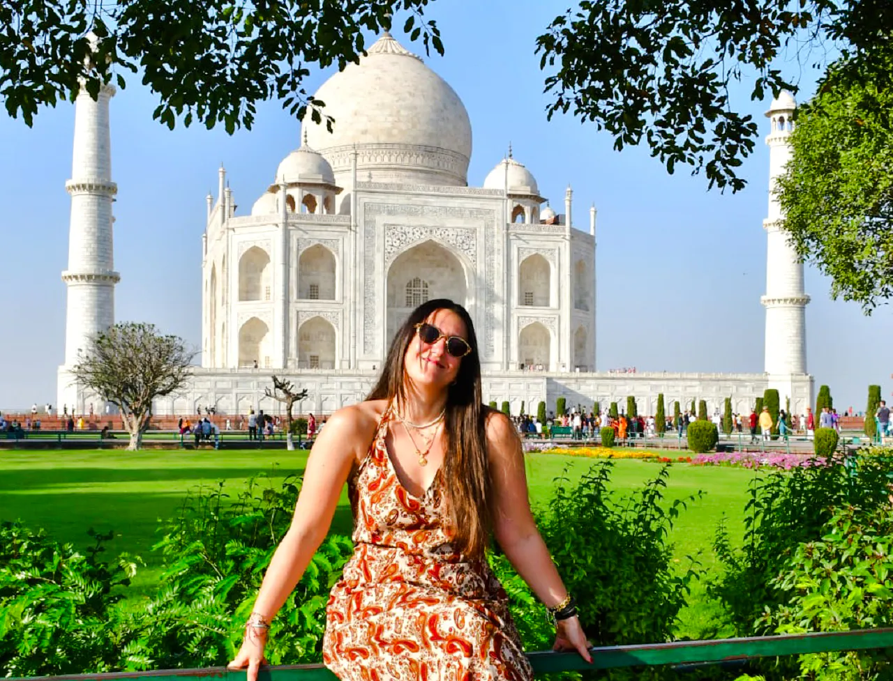 Visitor enjoying the view of the Taj Mahal in Agra, India.