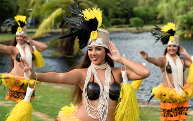 Dancers performing traditional hula at Smiths Family Garden Luau, Kauai.
