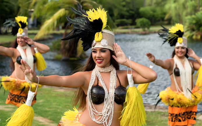Dancers performing traditional hula at Smiths Family Garden Luau, Kauai.