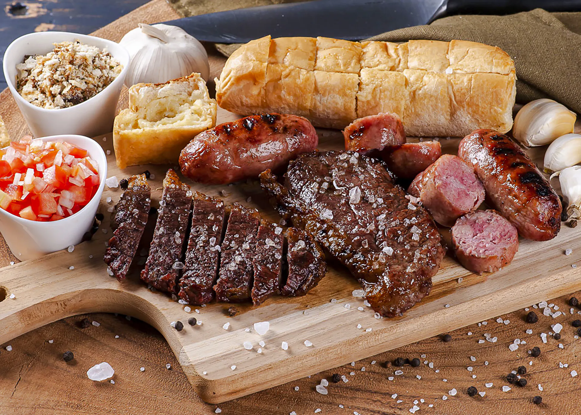 Assorted grilled meats and sides at a Brazilian steakhouse in Rio de Janeiro.