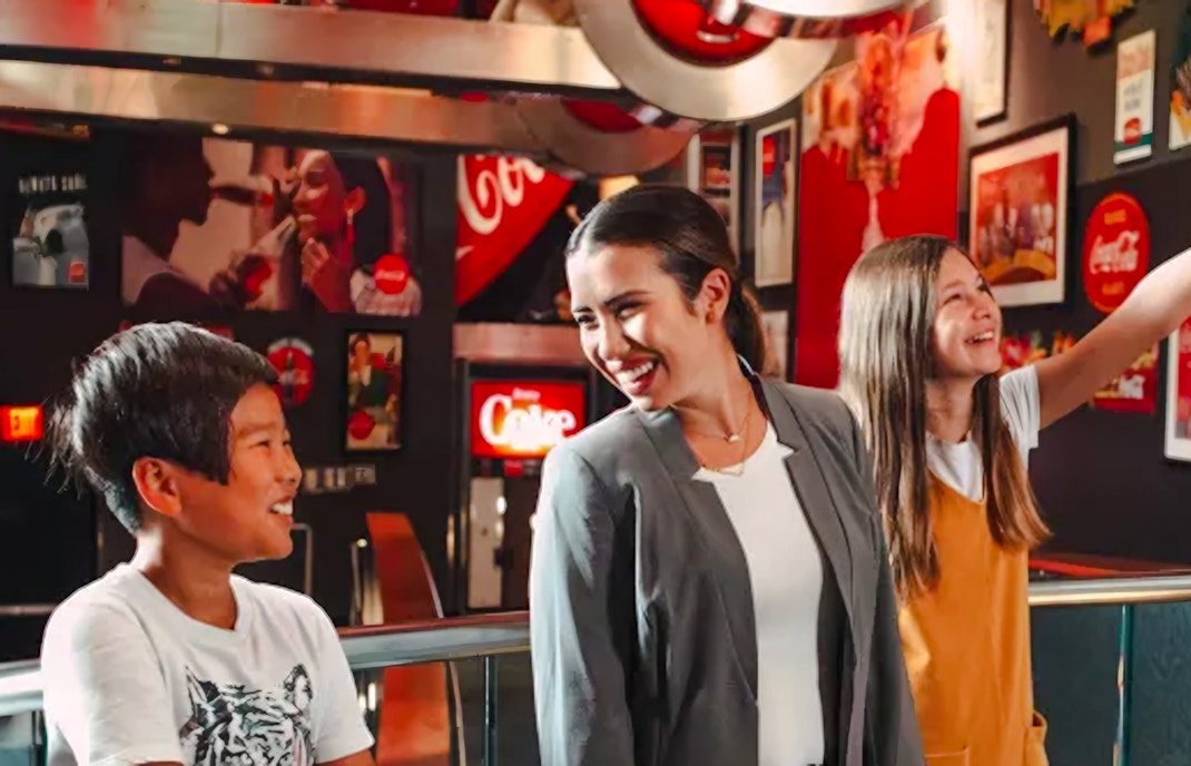 Visitors enjoying exhibits at The Loft, World of Coca-Cola, Atlanta.
