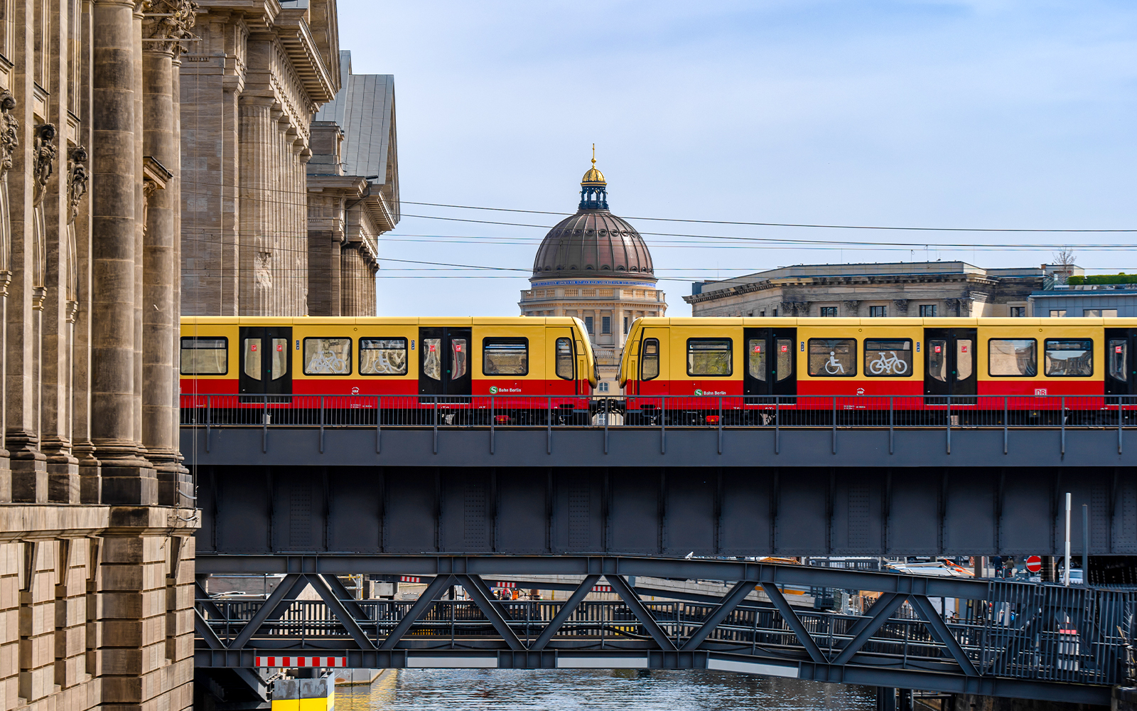 S-Bahn train crossing a bridge on Museum Island, Berlin.