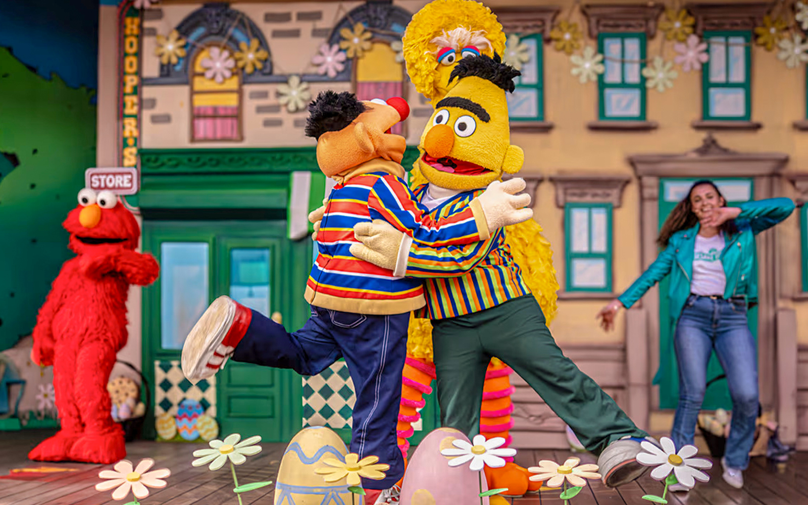 enjoying Easter festivities at Port Aventura theme park, Spain, with colorful decorations and activities.