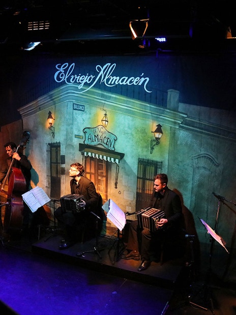 Musicians performing at El Viejo Almacén during a tango show in Buenos Aires.