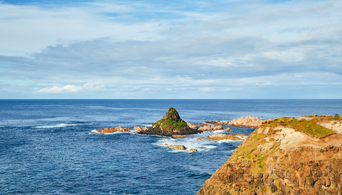 Pyramid Rock off Phillip Island's coast in Melbourne, showcasing unique rock formation.