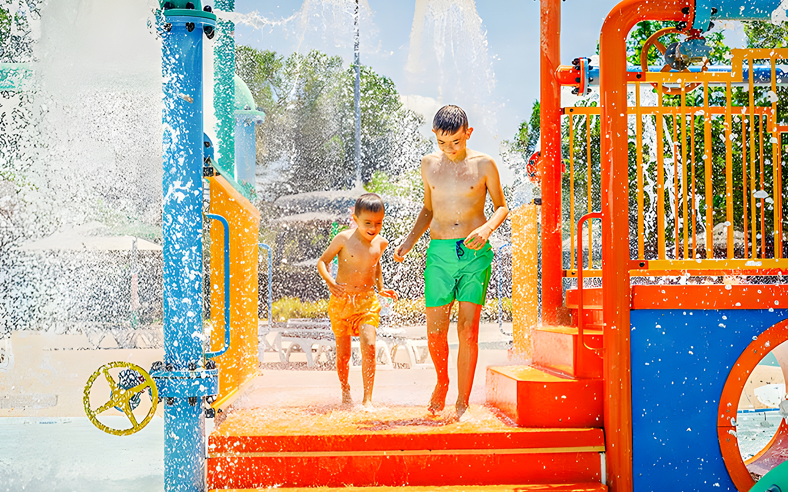 Children playing in water at Zona Infantil, Aquopolis.