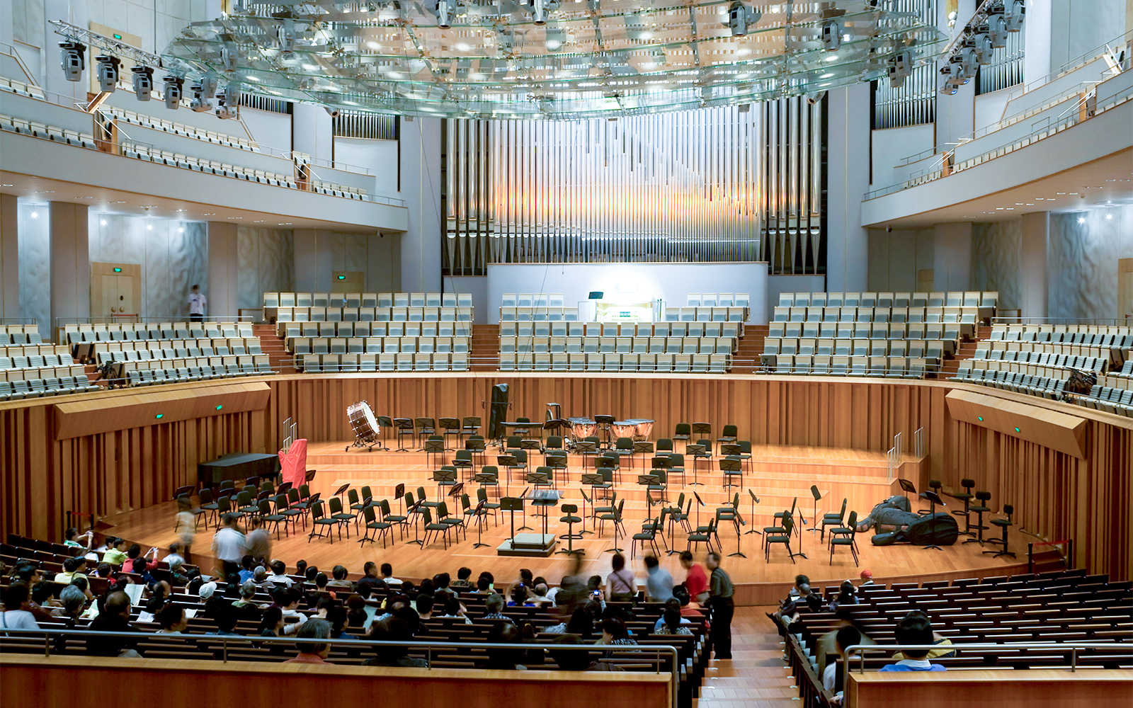 Concert hall interior with empty stage and audience seating for Barcelona Jazz Festival.