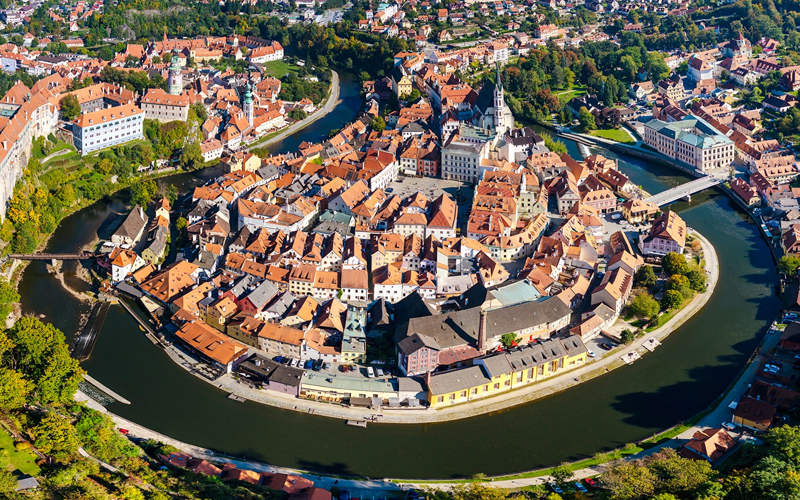 Drone view of Vltava River Bend and old town center, Cesky Krumlov, Czech Republic.