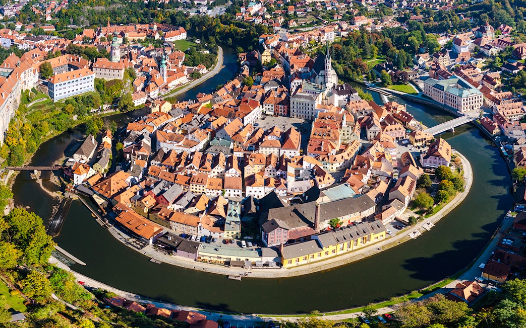 Drone view of Vltava River Bend and old town center, Cesky Krumlov, Czech Republic.