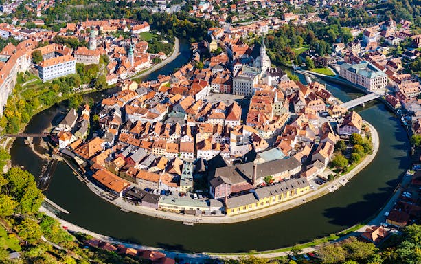 Drone view of Vltava River Bend and old town center, Cesky Krumlov, Czech Republic.
