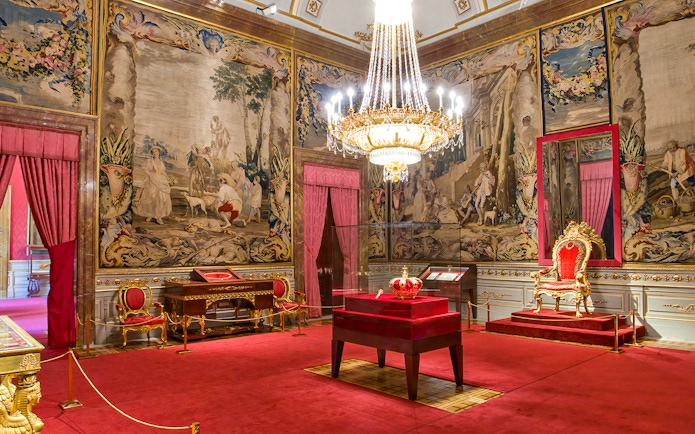 Crown of Charles III displayed inside the Royal Palace of Madrid.