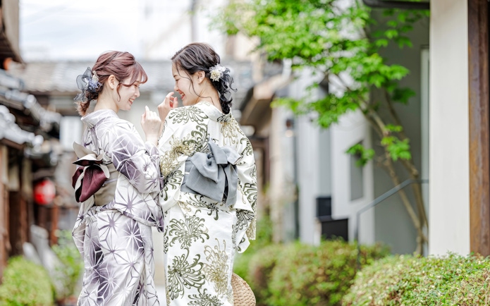 Young women in kimonos at a rental service in Kyoto, Japan.