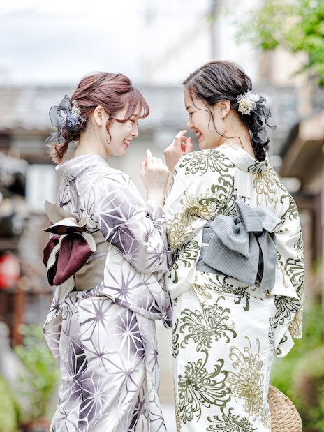 Young women in kimonos at a rental service in Kyoto, Japan.