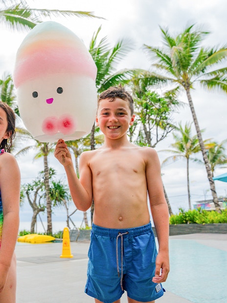 Kids holding cotton candy at Atlas Beach Club.