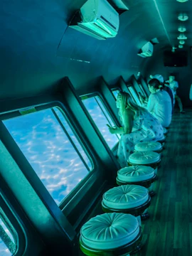 Tourists viewing underwater scenery on the Royal Seascope semi-submarine in the Red Sea, Hurghada.