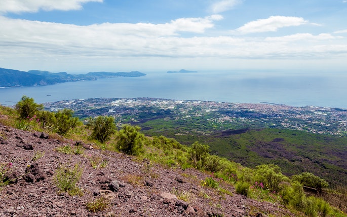 View from Vesuvius volcano overlooking the Bay of Naples and surrounding landscape.