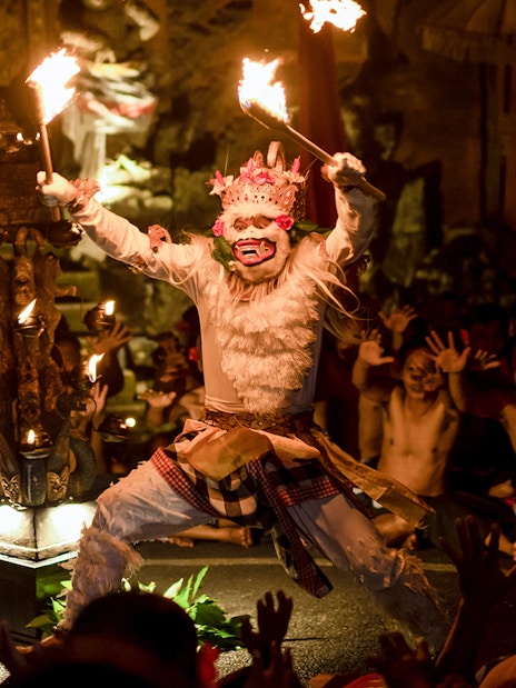 Performer in traditional costume at Kecak & Fire Dance Show, Ubud Peliatan Palace.