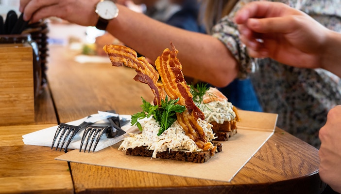 Open sandwich with bacon and tuna salad, danish smorrebrod