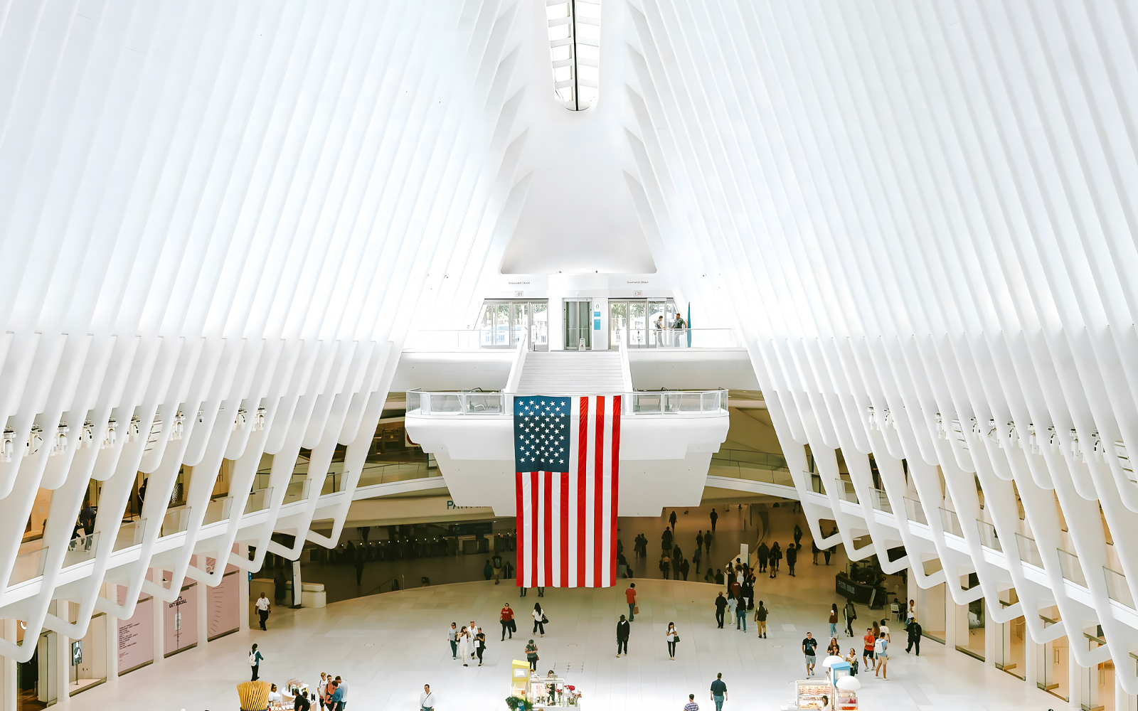 World Trade Center Transportation Hub interior with American flag hanging.