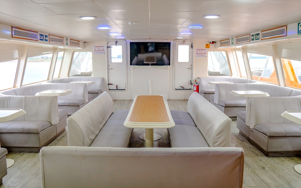 Ferry interior with spacious seating area on the Singapore to Batam route.
