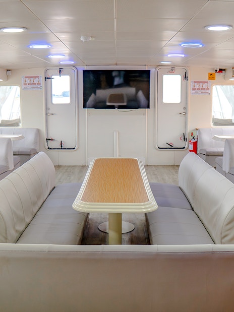 Ferry interior with spacious seating area on the Singapore to Batam route.