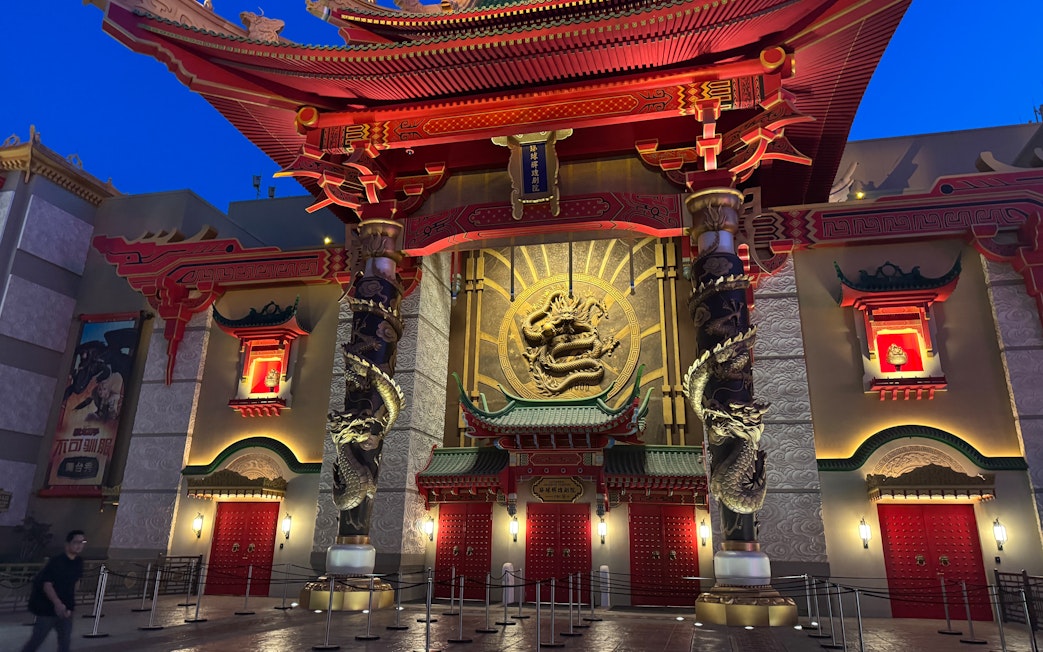 Ornate dragon-themed entrance at Universal Studios Beijing resort.