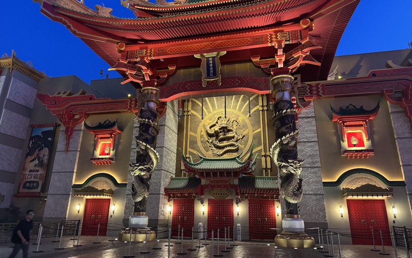 Ornate dragon-themed entrance at Universal Studios Beijing resort.