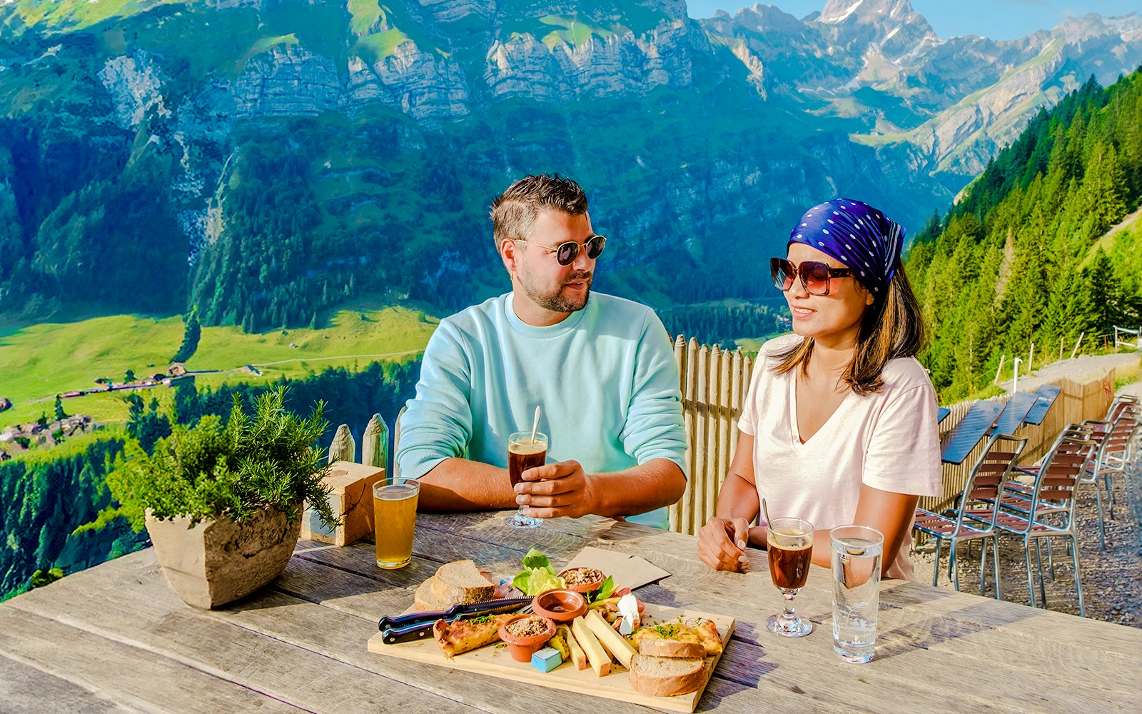 Harder Kulm restaurant terrace overlooking Interlaken and Swiss Alps.