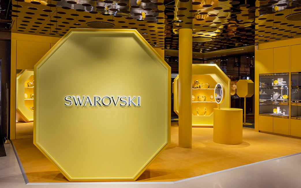 Swarovski display area in Vienna showcasing jewelry and decor items.