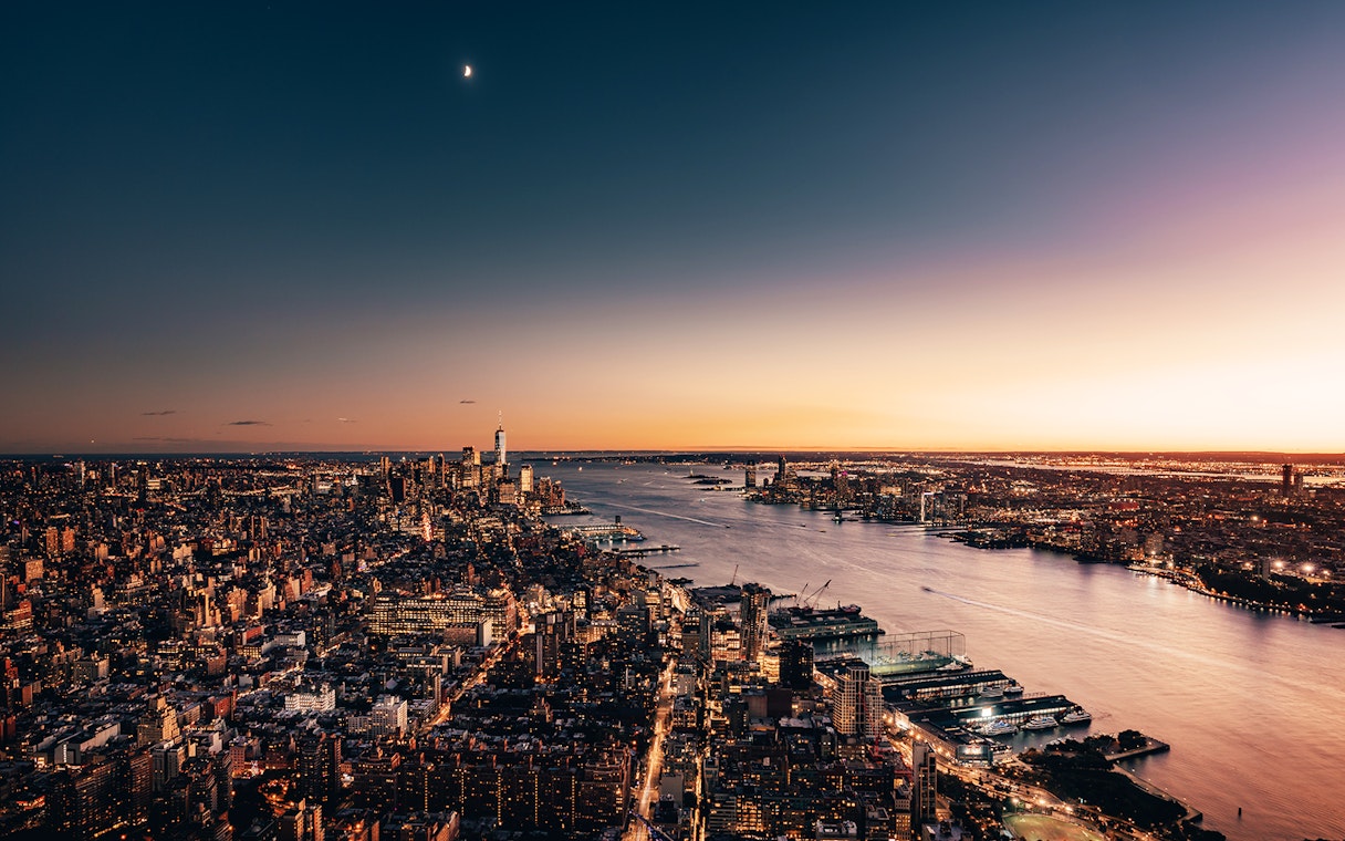 South view of New York City skyline and Hudson River from Edge Observation Deck at sunset.