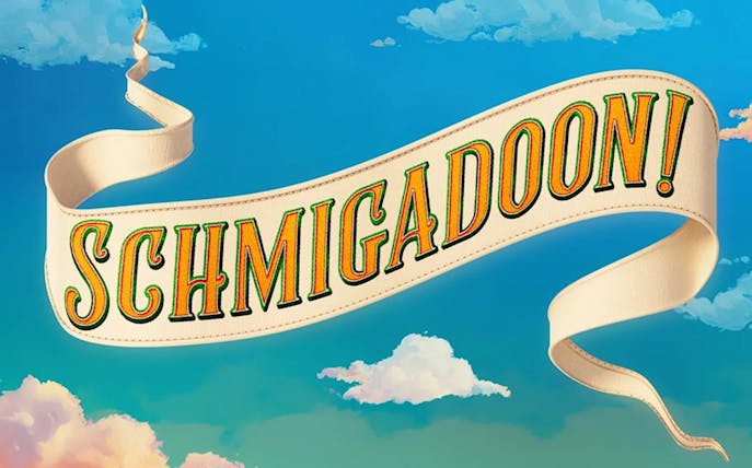 Schmigadoon banner against a blue sky with clouds