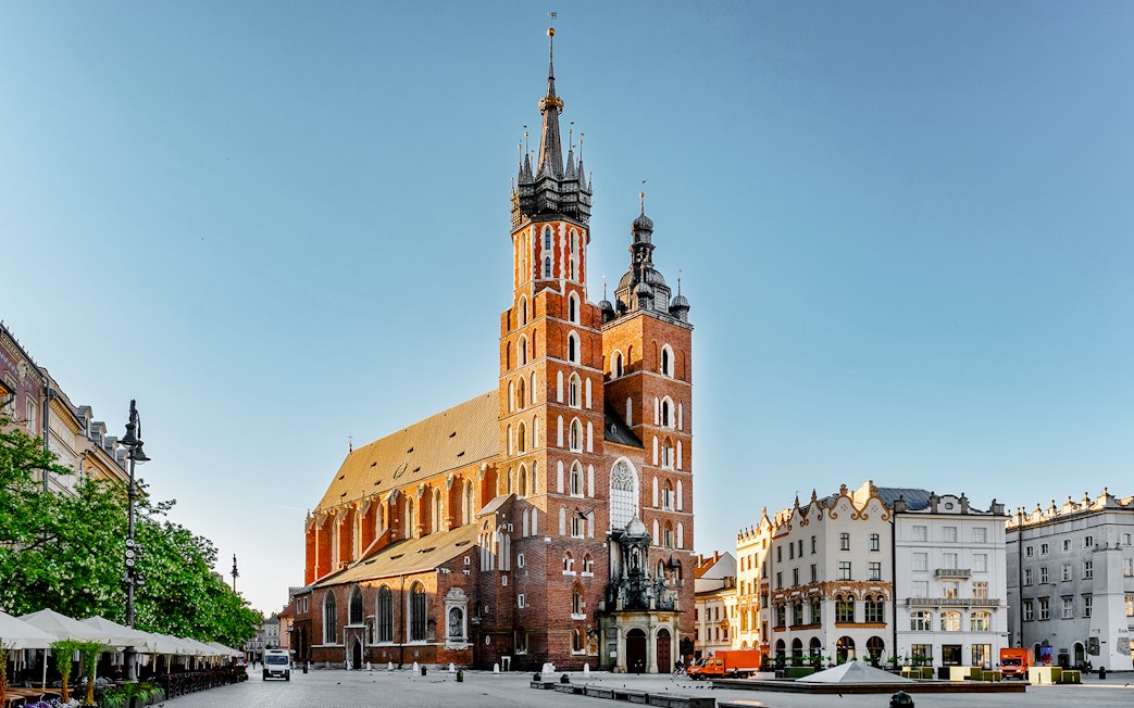 St. Mary's Church in Krakow's Main Square with surrounding buildings.