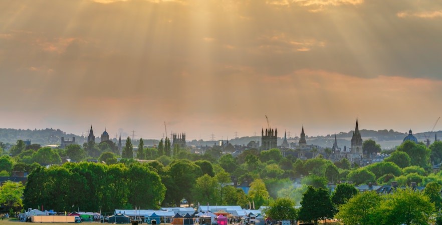 Oxford skyline from South Park, England, with spires and trees in the foreground.
