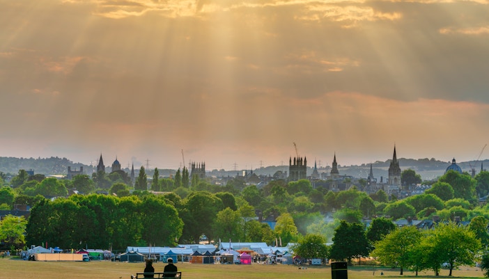 Oxford skyline from South Park, England, with spires and trees in the foreground.