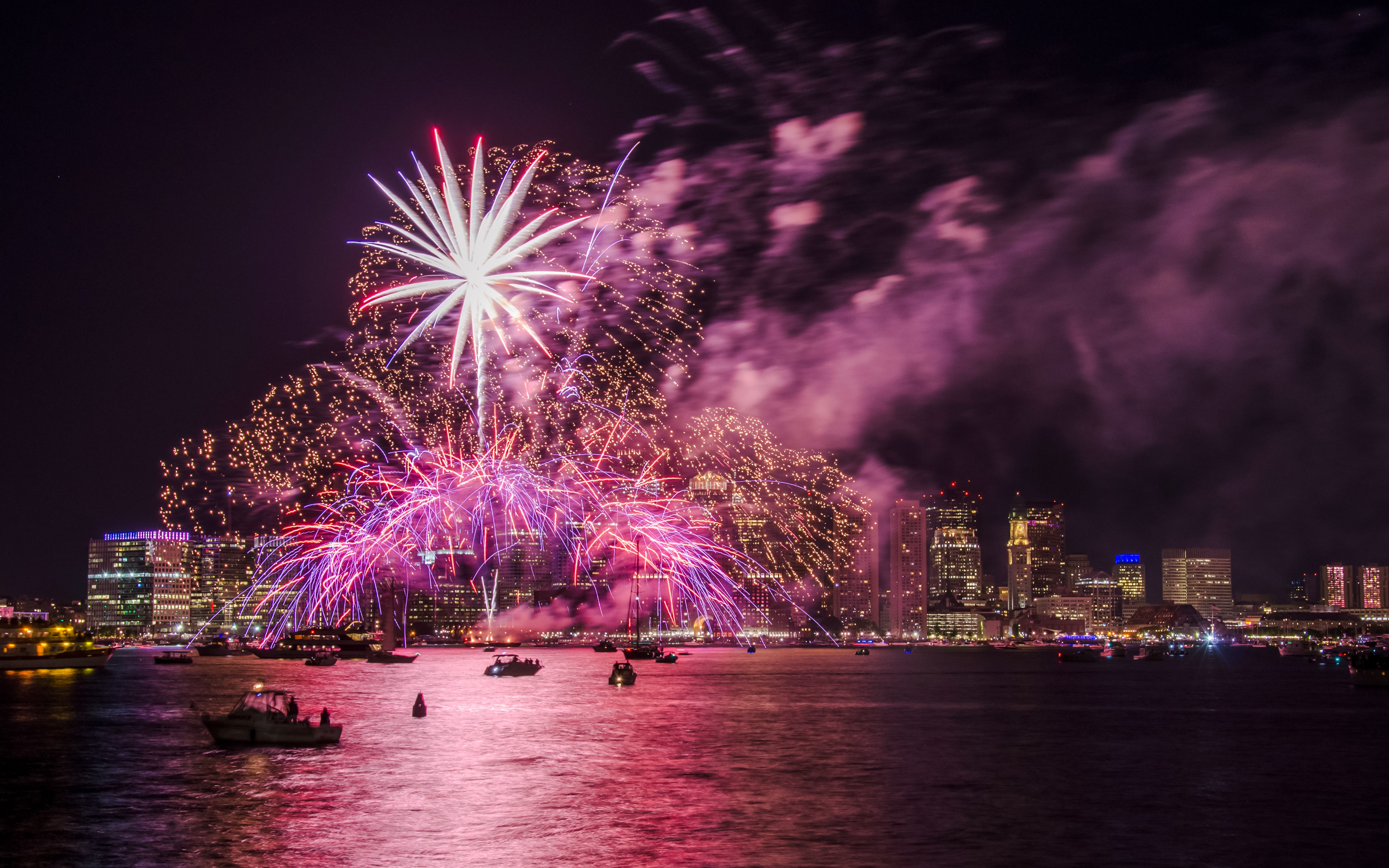 Fireworks over Boston Harbor during New Year celebration.