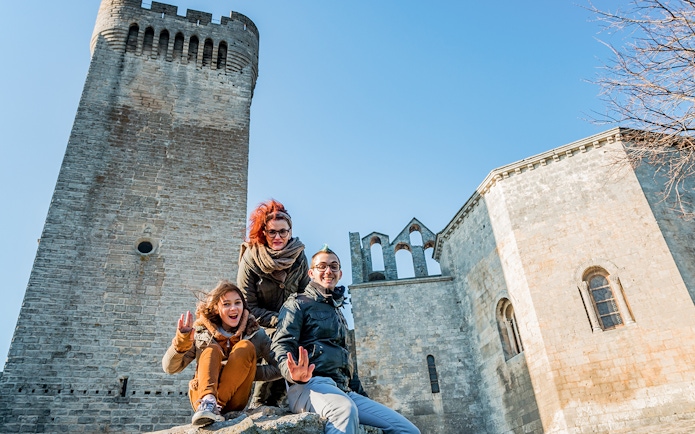Visitors enjoying Montmajour Abbey in Provence, France.