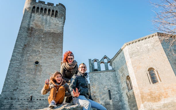 Visitors enjoying Montmajour Abbey in Provence, France.