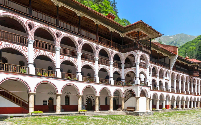 Rila Monastery courtyard with arched balconies, Bulgaria.