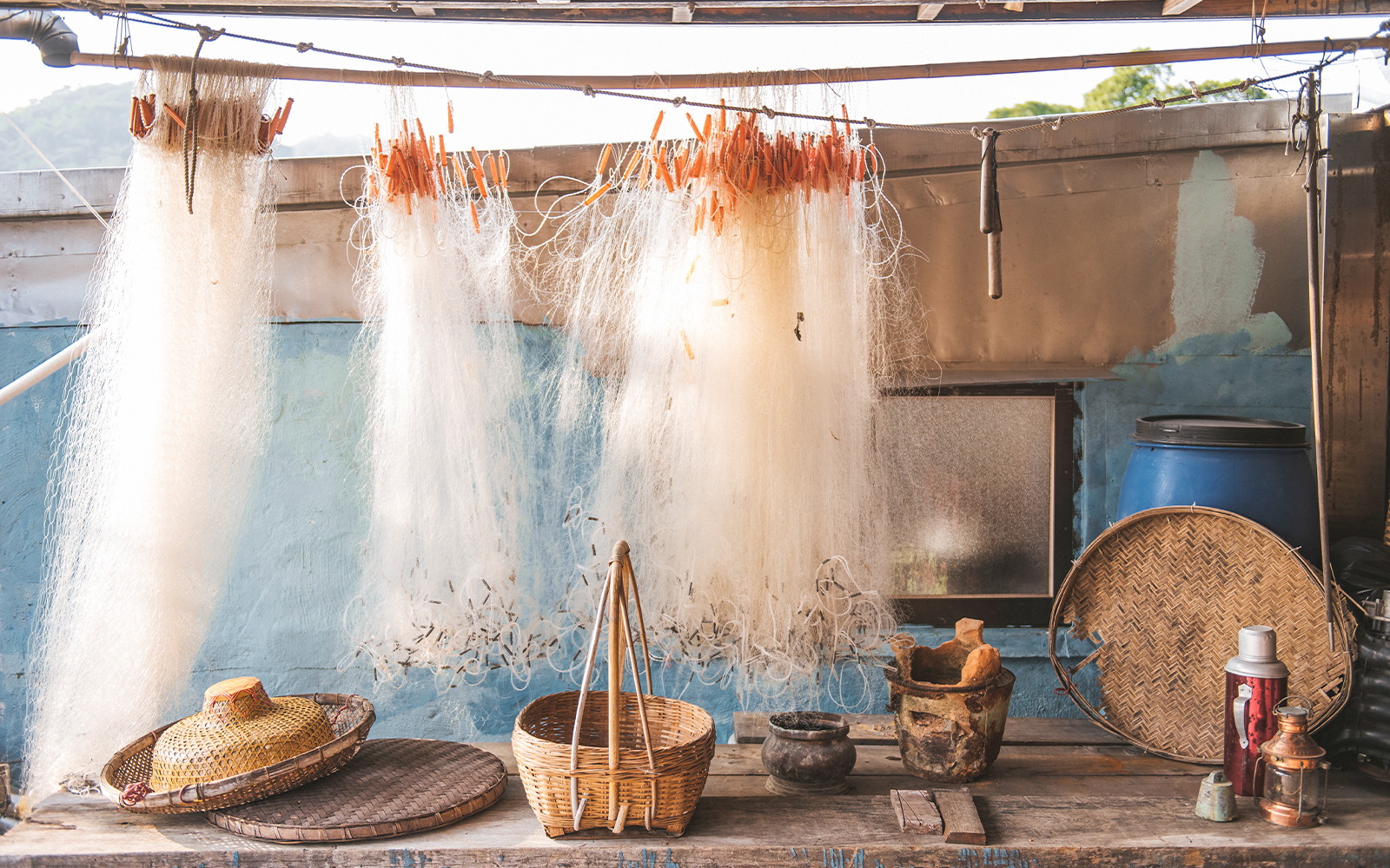 Fishing nets and baskets in Tai O village, Hong Kong, part of the 360 Tai O Pass experience.
