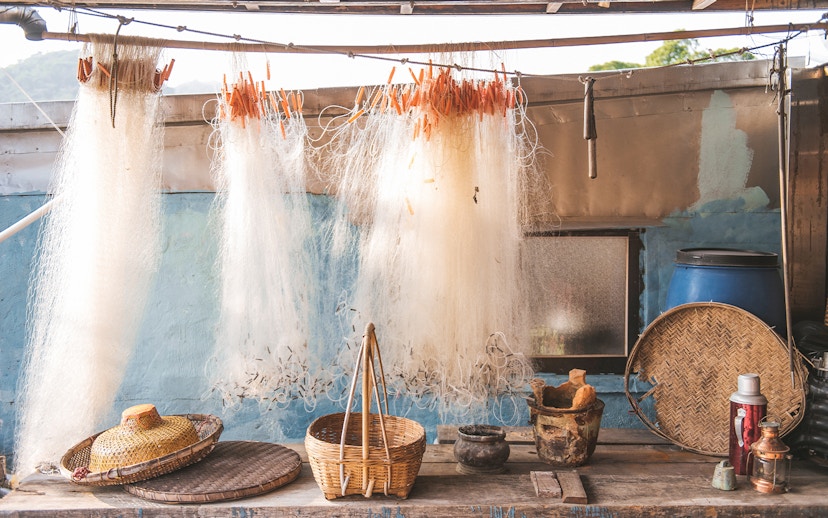 Fishing nets and baskets in Tai O village, Hong Kong, part of the 360 Tai O Pass experience.