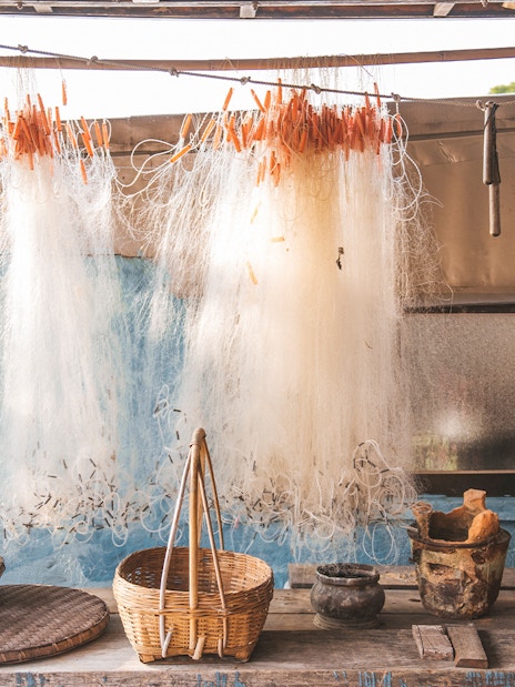 Fishing nets and baskets in Tai O village, Hong Kong, part of the 360 Tai O Pass experience.