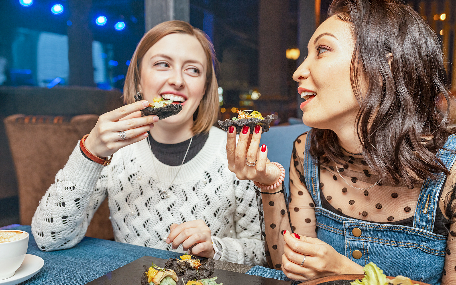 Seville food tour with local guide and group sampling traditional tapas in a vibrant market.