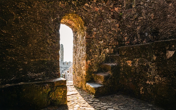 Moorish Castle Keep tower entrance with stone walls and steps, Sintra, Portugal.