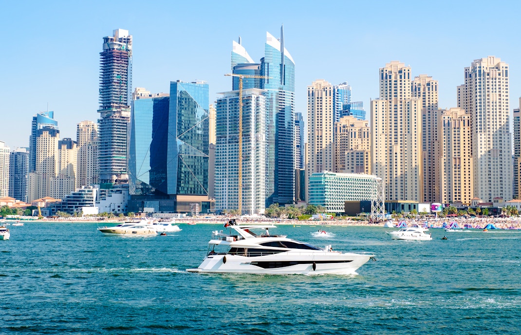 Luxury motor yachts sailing at Persian Gulf, Dubai, United Arab Emirates