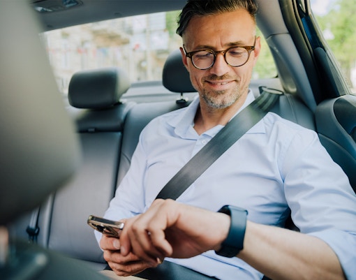 Private car interior with leather seats for city tour transfer.