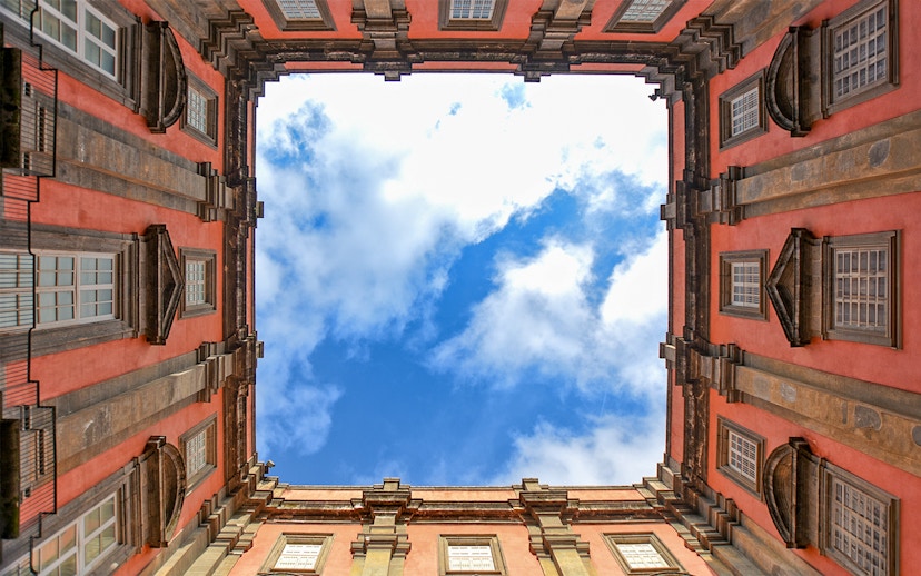 View of the sky framed by the courtyard of Museo di Capodimonte, Naples.