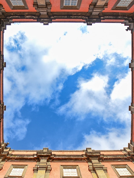View of the sky framed by the courtyard of Museo di Capodimonte, Naples.