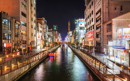 Tombori River Cruise at night, view of illuminated Dotonbori, Osaka.
