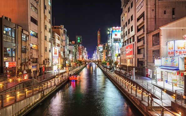 Tombori River Cruise at night, view of illuminated Dotonbori, Osaka.