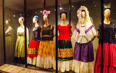 Traditional Mexican dresses on display at the Frida Kahlo Museum in Mexico City.